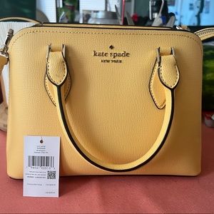 Kate spade cross body purse. With tags.